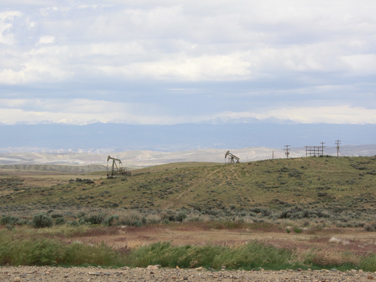 Pump jacks on a ridgeline in Wyoming.