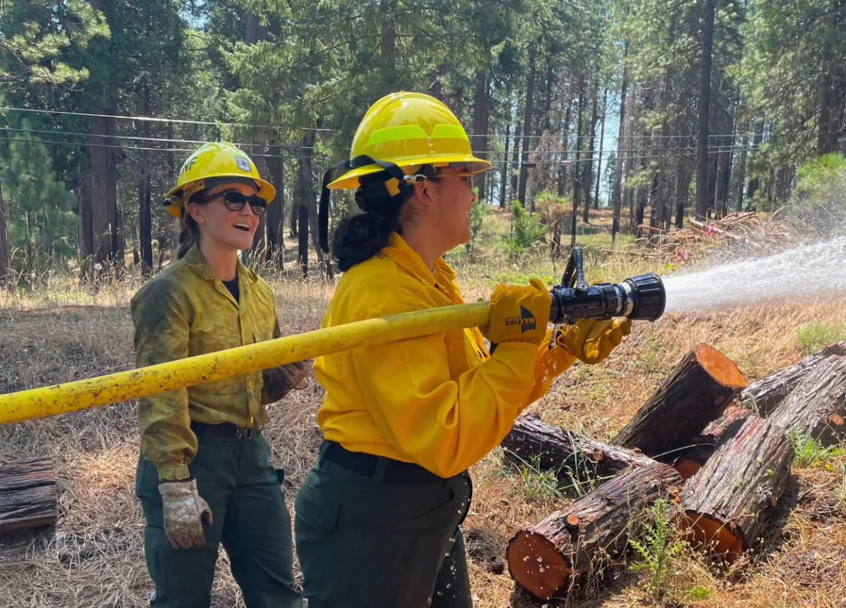 Two AmeriCorps NCCC Forest Corps members participate in field training in California last summer.